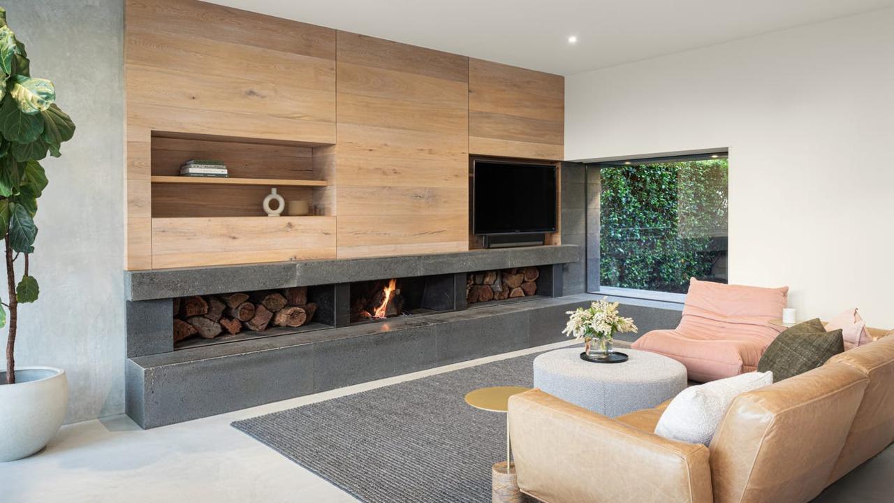 A lounge space with another feature fireplace.