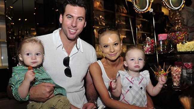 Grant Hackett and Candice Alley with their children in happier times.