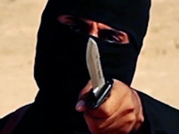 UPLOADED IMAGE - FILE - This image made from militant video, which has been verified by SITE Intelligence Group and is consistent with other AP reporting, shows Mohammed Emwazi, known as "Jihadi John,” who appeared in several videos depicting the beheadings of Western hostages. SITE, which tracks terrorist activity, says the Islamic State group is acknowledging the death of the masked militant and published a "eulogizing profile" of him on Tuesday, Jan. 19, 2016, in its English-language magazine Dabiq. (SITE Intelligence Group via AP)