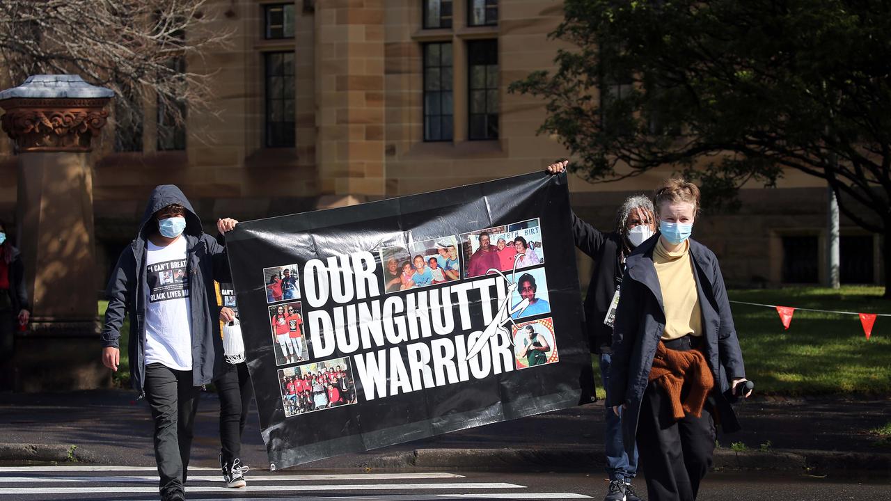 Protesters march towards the Domain before being surrounded by police outside St Mary’s Cathedral on Tuesday. Picture: Matrix