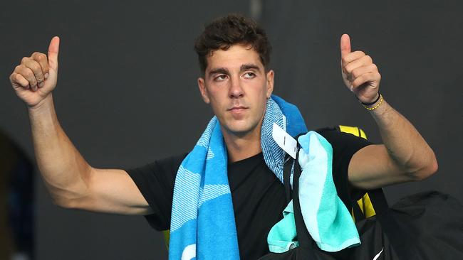 He’s back! Thanasi Kokkinakis celebrates his big win.