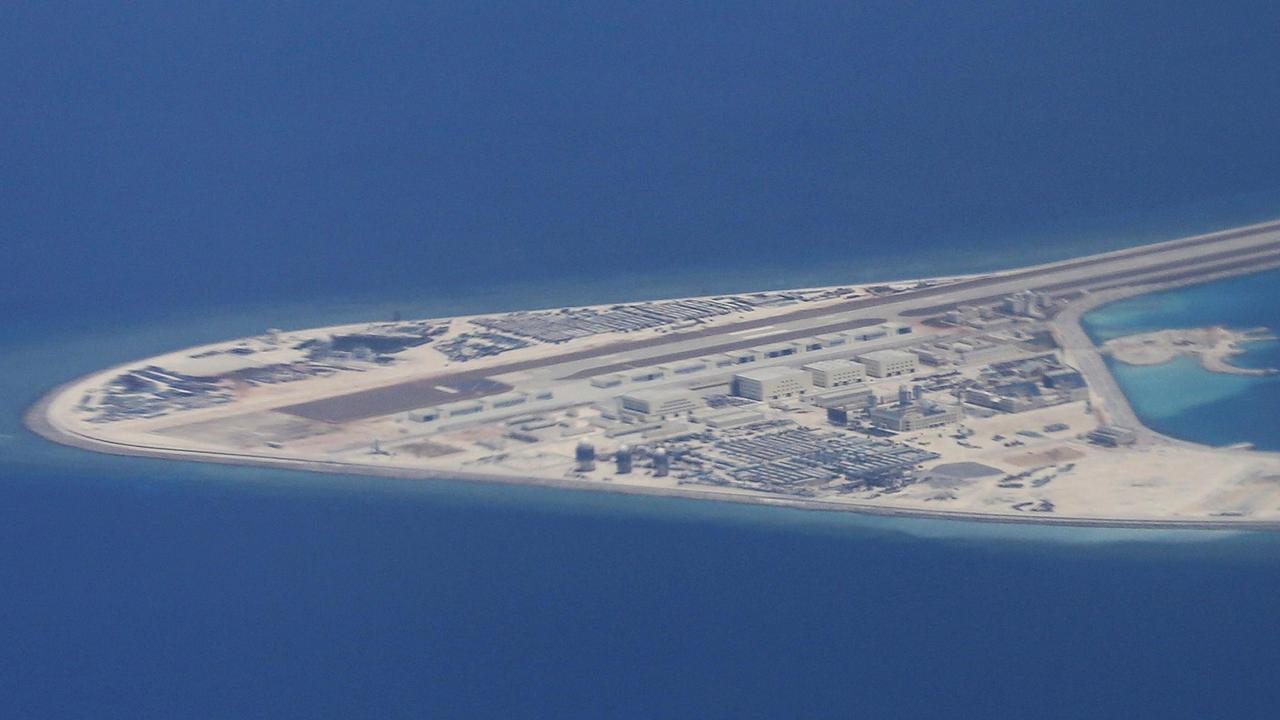 An image showing an airstrip, structures and buildings on China's man-made Subi Reef in the Spratly chain of islands in the South China Sea. Picture: AP