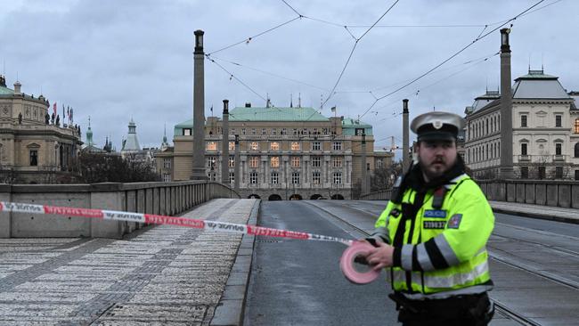 A police officer cordons off an area near the Charles University in central Prague. Picture: AFP