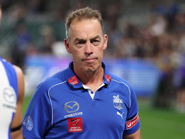 MELBOURNE, AUSTRALIA - APRIL 18: Alastair Clarkson, Senior Coach of the Kangaroos looks on as his players leave the field after the round six AFL match between North Melbourne Kangaroos and Carlton Blues at Marvel Stadium, on April 18, 2025, in Melbourne, Australia. (Photo by Daniel Pockett/Getty Images)