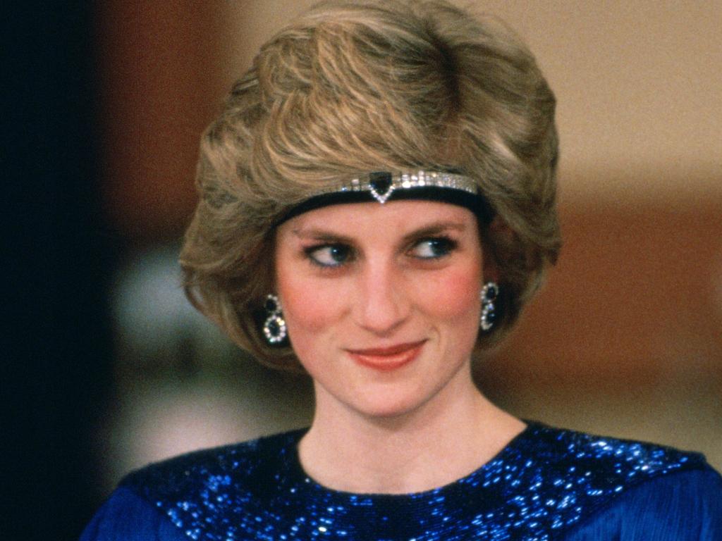 Diana loved a choker, and also this choker-as-headband look. Meghan/Kate, please look away. Picture: Tim Graham/Getty Images