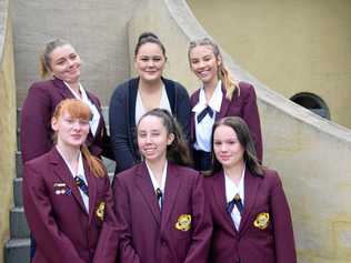 WELL DONE: Bursary winner Kaitlin Moat with Nanango State High School students: Gabby De Weers, Belinda Spencer, Samantha Taylor, Kate Perrett, and Amie Frohfloff. Picture: Madeline Grace