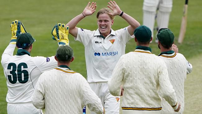 Nathan Ellis celebrates dismissing Blues batsman Nic Larkin on day 2 of the Sheffield Shield cricket match between the Tasmanian Tigers and the NSW Blues at Blundstone Arena, March 7, 2020. Picture: AAP Image/Dave Hunt