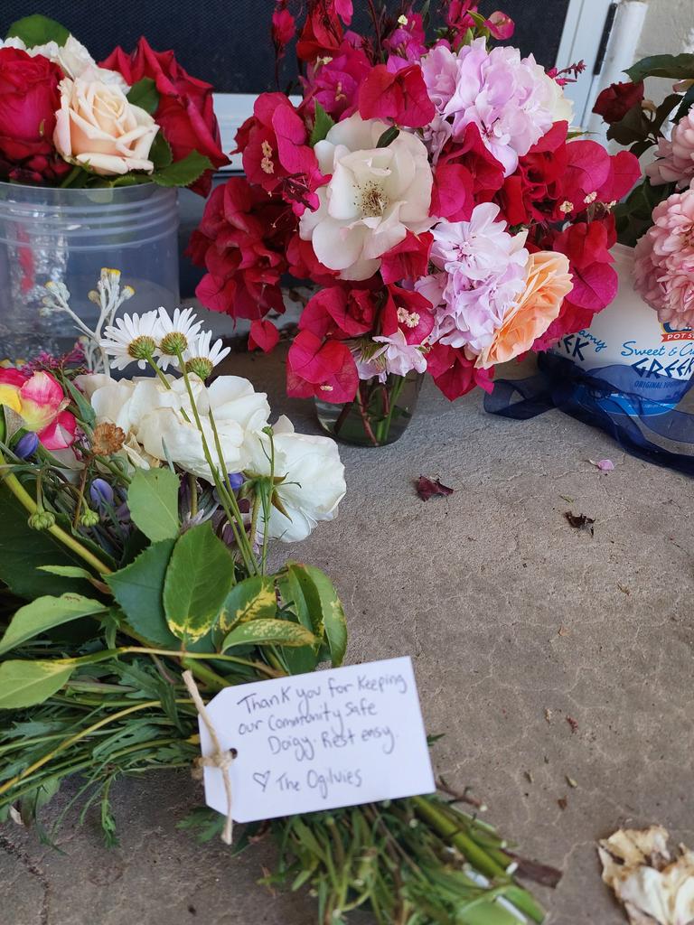 Floral tributes for Jason Doig left at the Lucindale police station. Picture: Supplied