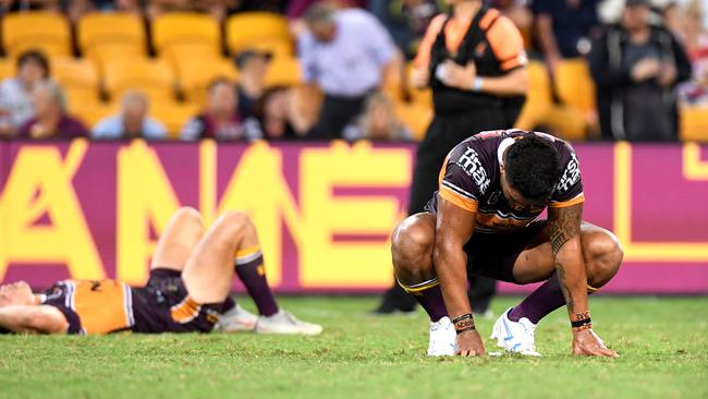 BRISBANE, AUSTRALIA - MARCH 28: Alex Glenn and Corey Oates of the Broncos looks dejected after their team loses the round 3 NRL match between the Brisbane Broncos and the St George Illawarra Dragons at Suncorp Stadium at Suncorp Stadium on March 28, 2019 in Brisbane, Australia. (Photo by Bradley Kanaris/Getty Images)