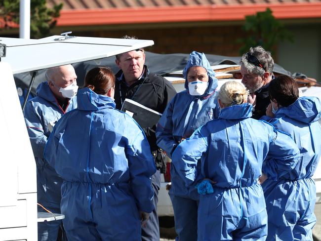 Tasmania Police investigators attending the manslaughter scene. Picture: Nikki Davis-Jones