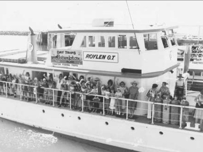 Historic: West Mackay Primary School students on a field trip in April 1980 took advantage of the service provided by Roylen Cruises. The fairmile-class vessel, pictured, was berthed inside the Mackay Harbour south wall. Photo Daily Mercury Archives