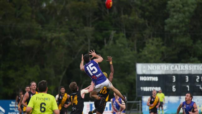 Pictured: Tyron Rainbird flies for mark. North Cairns Tigers v Cairns City Lions, Round 11 at Watsons Oval. AFL Cairns 2024. Photo: Gyan-Reece Rocha