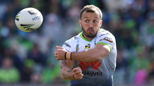 Josh Hodgson passes the ball during Canberra’s clash with the Wests Tigers. Picture: AAP