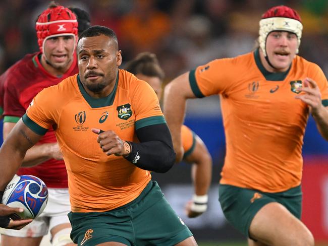 SAINT-ETIENNE, FRANCE - OCTOBER 01: Australia player Samu Kerevi makes a break during the Rugby World Cup France 2023 match between Australia and Portugal at Stade Geoffroy-Guichard on October 01, 2023 in Saint-Etienne, France. (Photo by Stu Forster/Getty Images)