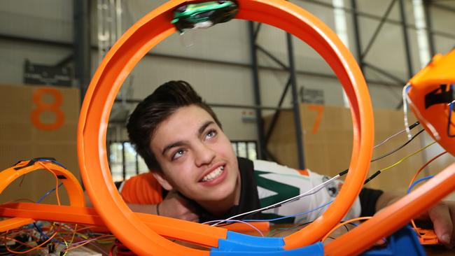 Gold Coast Schools Pop-up Science Centre at Coomera showcasing science in the South East Region. A Pictured is Andrei Bailey, 15, from Merrimac High with his Hot Wheels project. Picture: Glenn Hampson