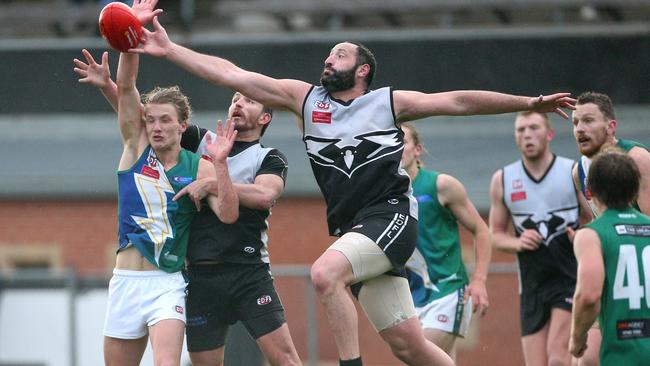 Roxburgh Park ruckman Ferras Merhi makes an impact on the contest. Picture: Hamish Blair