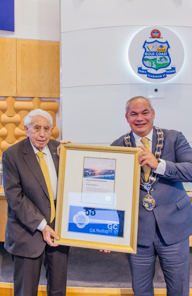 Meriton founder Harry Triguboff receives the keys to the city from Gold Coast Mayor Tom Tate. Picture: Supplied