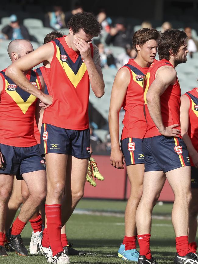 Ruckman Darcy Fort and the SANFL side after the loss. Picture: Sarah Reed