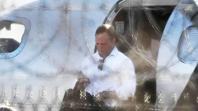 Queensland Premier Steven Miles exits a private jet at the Government Air Wing at Brisbane Airport. Picture: Lyndon Mechielsen