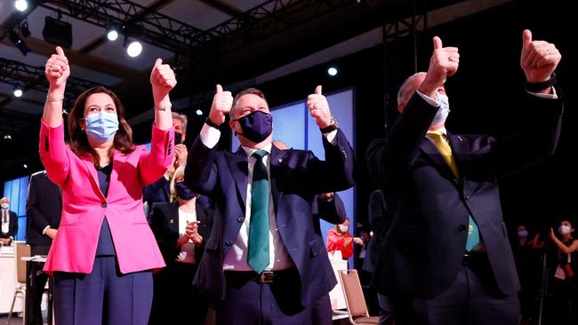 Queensland Premier Annastacia Palaszczuk, Brisbane Lord Mayor Adrian Schrinner and Australia's Sports Minister Richard Colbeck celebrate after Brisbane was announced as the 2032 Summer Olympics host city. Picture: Toru Hanai