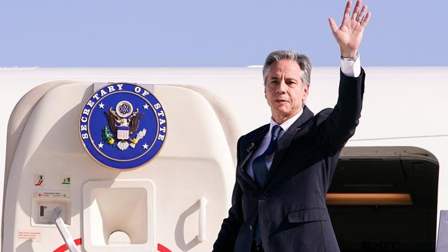 US Secretary of State Antony Blinken waves before boarding his aircraft at Ben Gurion International Airport in Lod on Wednesday as he departs for Riyadh for the Saudi leg of his trip. Picture: AFP