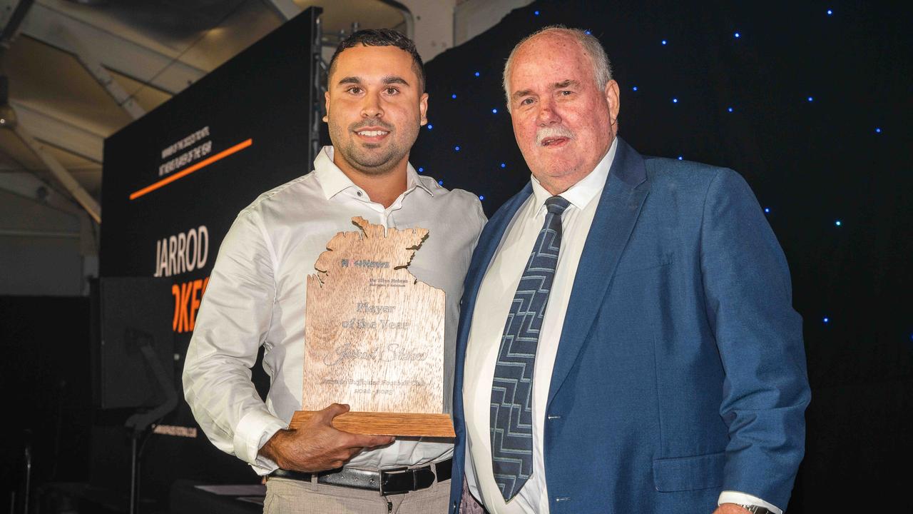 Grey Morris presents Jarrod Stokes with the NT News player of the year. Picture: Pema Tamang Pakhrin