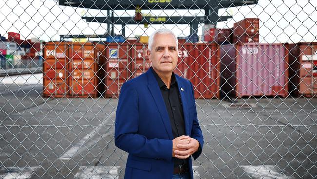 Transport Workers’ Union national secretary Michael Kaine at the fenced Moorebank Intermodal Precinct in Sydney. Picture: John Feder/The Australian.