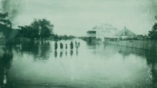 Floods in Lennox Street, Maryborough, 1893. Submerged streets highlight the impact of the devastating floods of 1893. Source: Fraser Coast Libraries