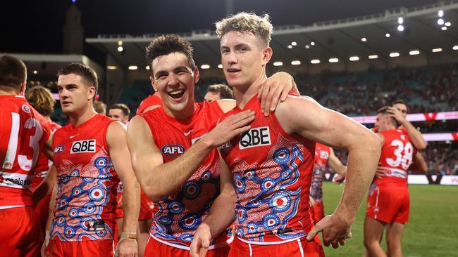 Errol Gulden and Chad Warner of the Swans celebrate. Photo by Cameron Spencer/AFL Photos/via Getty Images