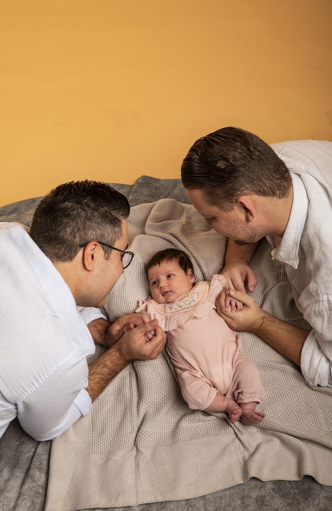 Baden and Nelson Marino-Hall with baby Amalia. Picture: Mark Cranitch