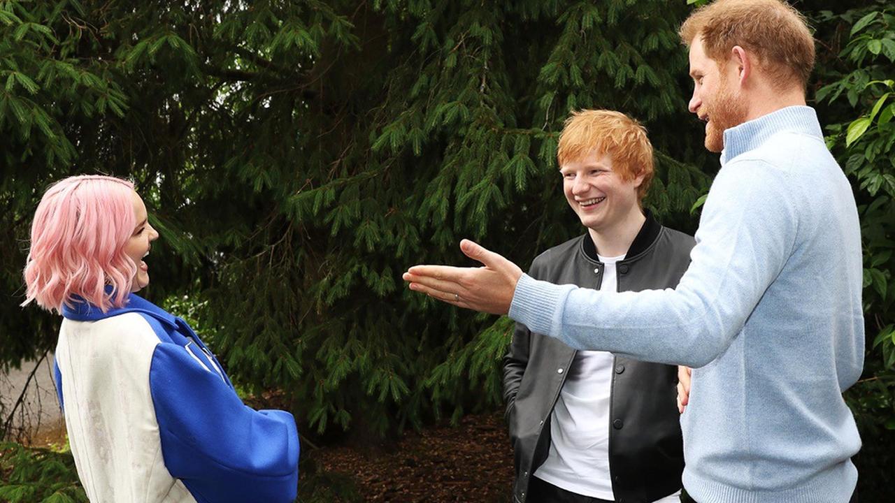 Prince Harry speaking to Ed Sheeran and Anne-Marie during the WellChild Awards 2021 at a private garden party at Kew Gardens, in London. Picture: Antony Thompson/TWM/WellChild/PA Wire