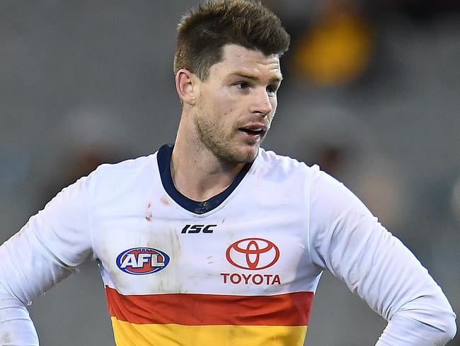 Bryce Gibbs of the Crows (right) reacts during the Round 13 AFL match between the Hawthorn Hawks and the Adelaide Crows at the MCG in Melbourne, Saturday, June 16, 2018. (AAP Image/Julian Smith) NO ARCHIVING, EDITORIAL USE ONLY