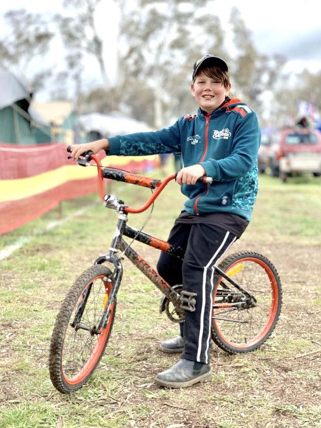 Race fan Zac Bourke pictured on 'The Hill" campsite. Picture: Richard Dobson iphone image