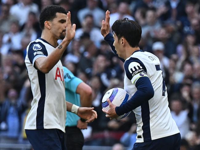 Son Heung-Min (right) celebrates with Tottenham teammate Dominic Solanke after scoring his side’s second . Picture: AFP