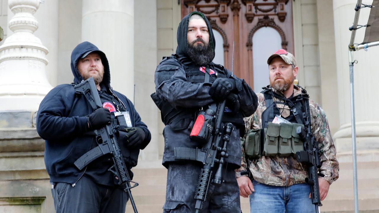 Armed protesters take part in an American Patriot Rally in Michigan in April, demanding the reopening of businesses. Picture: AFP