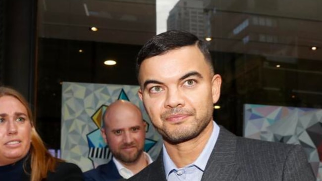 Guy Sebastian leaves court on Wednesday.