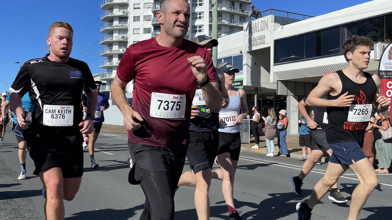 Stuart Bryant leads Cam Keith in the 10km at the 2022 Sunshine Coast Marathon and Community Run Festival.