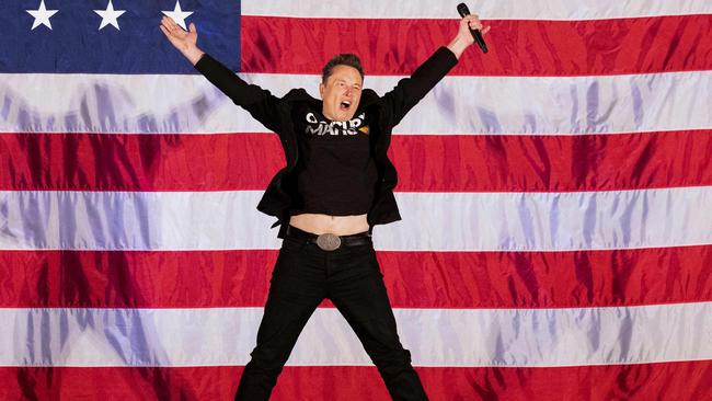 Elon Musk enjoying himself at a pro-Trump event during the election campaign. Picture: Ryan Collerd/AFP