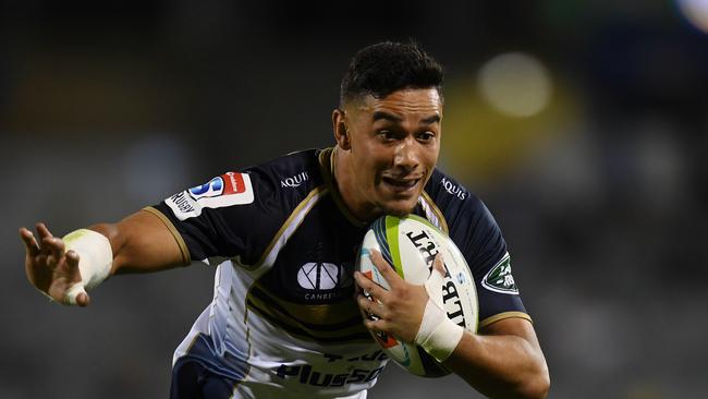 Wharenui Hawera of the Brumbies makes a break to score a try at GIO Stadium in Canberra.