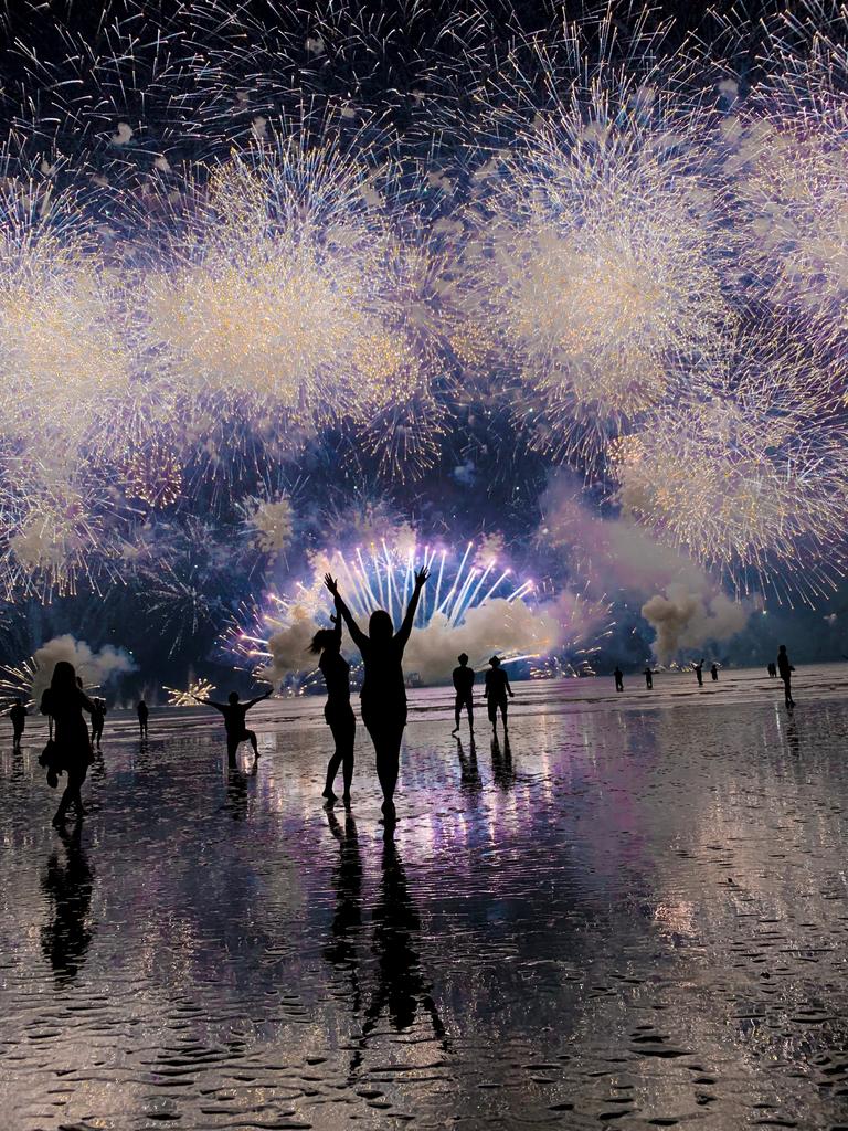 Lily North and Katrina Leembruggen enjoy the Fireworks at Mindil Beach. Picture: Supplied