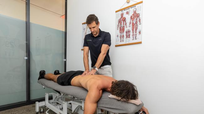 Josh Tidswell treats a patient. Picture: Pema Tamang Pakhrin