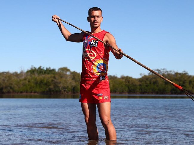 GOLD COAST, AUSTRALIA - MAY 14: poses during the unveiling of the Gold Coast Suns 2021 Indigenous AFL guernsey at Palm Beach River on May 14, 2021 in Gold Coast, Australia. (Photo by Chris Hyde/Getty Images)