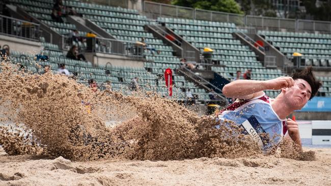 Angus Clues in the long jump on Monday.