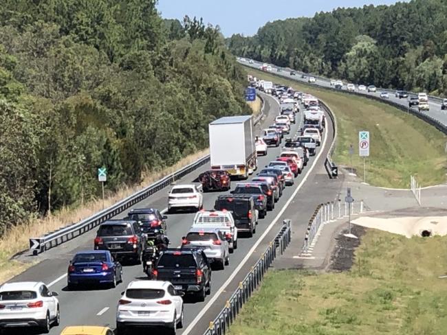 Traffic banked up on the Bruce Highway underneath the Red Rd overpass in Beerburrum.