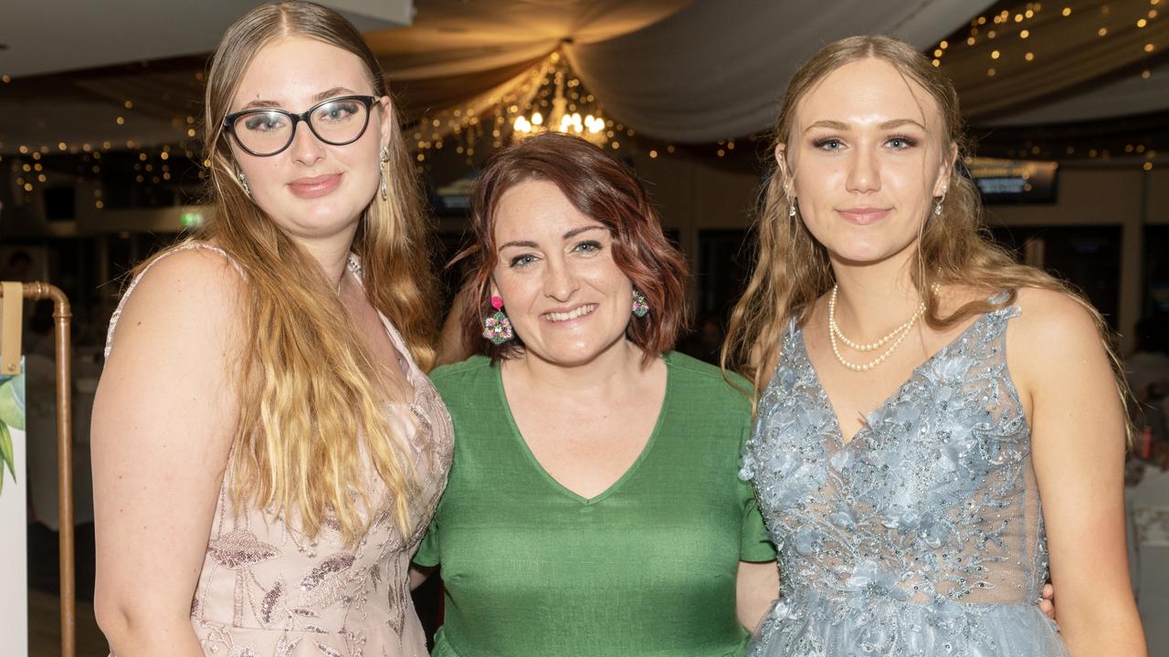 Haylee Dobins, Mrs Alicia Nicol Hospitality teacher and Ashlee Marshall at Sarina State High School Year 12 Formal Wednesday 16 November 2022. Picture: Michaela Harlow