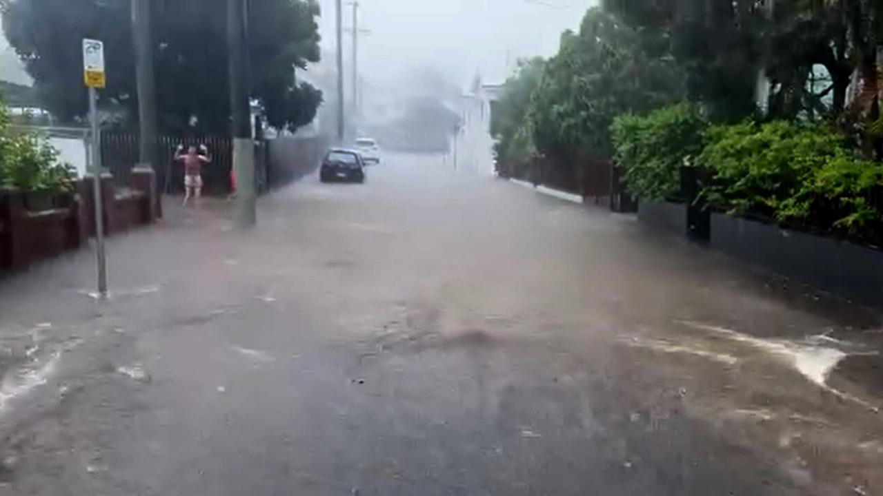 Heavy rainfall has caused flash flooding on Baynes Street in West End on Sunday afternoon. Video: Quinton Nicholson