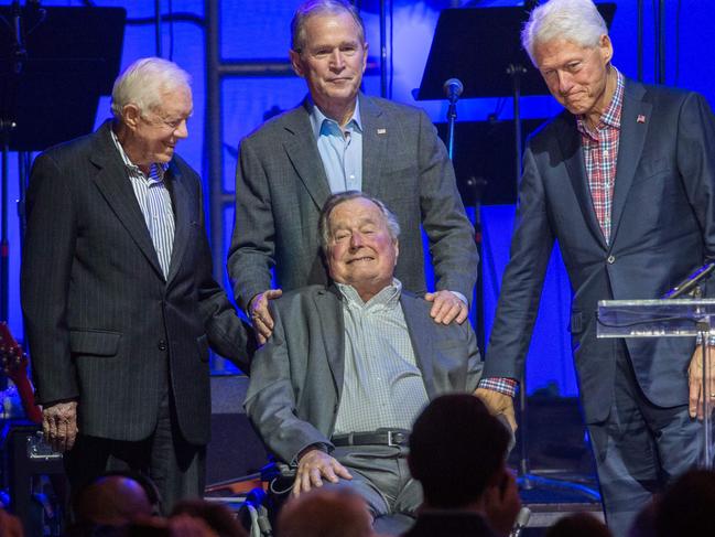 Jimmy Carter (left) in 2017 with former presidents George H. W. Bush, George W. Bush and Bill Clinton. Picture: Jim Chapin