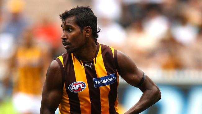 MELBOURNE, AUSTRALIA - MARCH 27:  Carl Peterson of the Hawks looks for a teammate during the round one AFL match between the Melbourne Demons and the Hawthorn Hawks at Melbourne Cricket Ground on March 27, 2010 in Melbourne, Australia.  (Photo by Mark Dadswell/Getty Images)