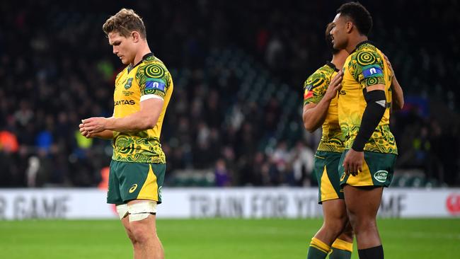 Michael Hooper, Nick Phipps and Samu Kerevi after the loss to England.