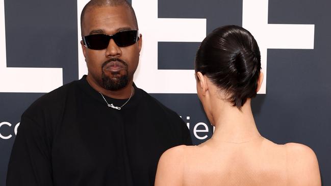 PIXELATED VERSIONS -  LOS ANGELES, CALIFORNIA - FEBRUARY 02: (EDITOR'S NOTE: Image contains nudity.) L-R, Kanye West and Bianca Censori attend the 67th Annual GRAMMY Awards on February 02, 2025 in Los Angeles, California.  (Photo by Matt Winkelmeyer/Getty Images for The Recording Academy)